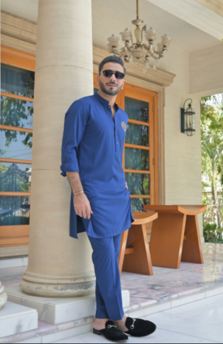 Teal blue kurta pajama with brand logo on chest